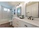 Modern bathroom with double vanity, patterned tile, and updated fixtures at 8732 E Valley Vista Dr, Scottsdale, AZ 85250