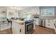 Modern kitchen with island and stainless steel appliances at 8732 E Valley Vista Dr, Scottsdale, AZ 85250