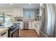 Modern kitchen with white cabinets and a farmhouse sink at 8732 E Valley Vista Dr, Scottsdale, AZ 85250