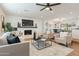 Open living space with fireplace and built-in shelving at 8732 E Valley Vista Dr, Scottsdale, AZ 85250