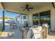 Relaxing patio with covered seating area, adjacent to the pool at 8732 E Valley Vista Dr, Scottsdale, AZ 85250