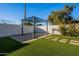 Covered patio area with pergola and artificial turf at 8732 E Valley Vista Dr, Scottsdale, AZ 85250