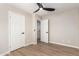 Bedroom with double door closet and laminate wood flooring at 874 E Tyson St, Chandler, AZ 85225