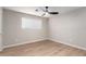 Bedroom with ceiling fan and laminate wood flooring at 874 E Tyson St, Chandler, AZ 85225