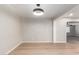 Dining room with wood-look floors and a view into another room at 874 E Tyson St, Chandler, AZ 85225