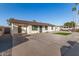 Newly renovated home with artificial turf and gravel at 874 E Tyson St, Chandler, AZ 85225