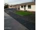 Landscaped front yard with artificial turf and rock at 874 E Tyson St, Chandler, AZ 85225