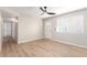 Light and airy living room with ceiling fan and hardwood floors at 874 E Tyson St, Chandler, AZ 85225