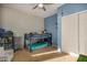 ' bedroom with bunk bed and ample storage at 8805 W Windrose Dr, Peoria, AZ 85381