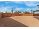 Large backyard with gravel and wood fence at 902 S 96Th St, Mesa, AZ 85208