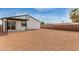 House backyard view with wood fence at 902 S 96Th St, Mesa, AZ 85208