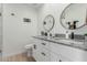 Modern bathroom with double vanity and walk-in shower at 902 S 96Th St, Mesa, AZ 85208