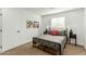 Guest bedroom with a full-size bed and window at 902 S 96Th St, Mesa, AZ 85208