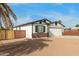 Newly built home with a modern design, clean lines, and a well-manicured yard at 902 S 96Th St, Mesa, AZ 85208