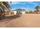 Front yard view of a newly built home with a modern design and clean lines at 902 S 96Th St, Mesa, AZ 85208