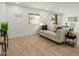 Spacious living room with a light-colored sofa and plenty of natural light at 902 S 96Th St, Mesa, AZ 85208