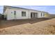 Large backyard with a covered patio and plenty of space at 10229 N 177Th Dr, Waddell, AZ 85355