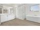 Spa-like bathroom with soaking tub and walk-in shower at 10229 N 177Th Dr, Waddell, AZ 85355