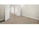 Simple bedroom with tile floors and double doors at 10229 N 177Th Dr, Waddell, AZ 85355