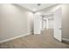 Simple bedroom with tile floors and double doors at 10229 N 177Th Dr, Waddell, AZ 85355