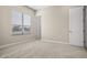 Well-lit bedroom with carpet and window coverings at 10229 N 177Th Dr, Waddell, AZ 85355