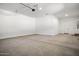 Spacious garage with automatic opener and ample storage space at 10229 N 177Th Dr, Waddell, AZ 85355
