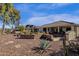 Spacious backyard with desert landscaping and a brick wall at 10254 N Demaret Dr, Fountain Hills, AZ 85268