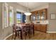 Breakfast nook with a wooden table and built-in cabinetry at 10254 N Demaret Dr, Fountain Hills, AZ 85268