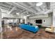Relaxing common area with seating, TV, and game tables at 114 W Adams St # 203, Phoenix, AZ 85003