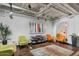 Common area with comfortable seating and modern art at 114 W Adams St # 203, Phoenix, AZ 85003