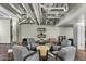 Comfortable common area with seating and circular table at 114 W Adams St # 203, Phoenix, AZ 85003