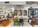 Modern dining area with a long wooden table and stylish chairs at 114 W Adams St # 203, Phoenix, AZ 85003