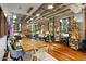 Open concept dining area with wood table and modern chairs at 114 W Adams St # 203, Phoenix, AZ 85003