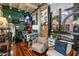 Comfortable living area with exposed brick and hardwood floors at 114 W Adams St # 203, Phoenix, AZ 85003