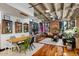 Spacious living room featuring hardwood floors and exposed brick at 114 W Adams St # 203, Phoenix, AZ 85003