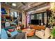 Spacious living area with hardwood floors and exposed brick at 114 W Adams St # 203, Phoenix, AZ 85003