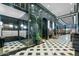 Elegant lobby with marble and checkerboard floors, creating a sophisticated ambiance at 114 W Adams St # 203, Phoenix, AZ 85003