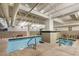 Indoor pool and jacuzzi with tiled surround at 114 W Adams St # 203, Phoenix, AZ 85003