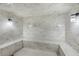 Clean and spacious steam room with tiled walls at 114 W Adams St # 203, Phoenix, AZ 85003