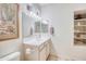 Bathroom featuring a vanity, shelves, and toilet at 11500 E Cochise Dr # 2019, Scottsdale, AZ 85259