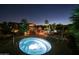 Relaxing hot tub at night surrounded by landscaping at 11500 E Cochise Dr # 2019, Scottsdale, AZ 85259