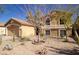 Charming home with a neutral exterior, a well-maintained yard, and attached garage at 11825 S 46Th St, Phoenix, AZ 85044