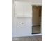 Practical garage entrance with storage cabinets, providing convenient access and organization at 11825 S 46Th St, Phoenix, AZ 85044