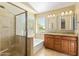 Bathroom featuring tile floors, a double sink vanity with granite countertop, a shower and soaking tub combo at 11825 S 46Th St, Phoenix, AZ 85044