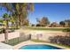 Breathtaking view from the pool of the lush golf course creating a serene outdoor oasis at 11825 S 46Th St, Phoenix, AZ 85044