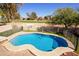 Beautiful pool with stunning views of the nearby golf course and mature trees at 11825 S 46Th St, Phoenix, AZ 85044