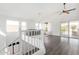 Bonus room featuring a vaulted ceiling, recessed lighting, and a sliding glass door at 12445 N 42Nd Dr, Phoenix, AZ 85029