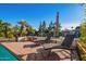 Relaxing patio with lounge chairs near a refreshing blue pool at 1321 E Bayview Dr, Tempe, AZ 85283