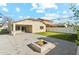 Spacious backyard with fire pit and artificial turf at 1381 W Birch Rd, Queen Creek, AZ 85140
