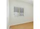 Simple bedroom with hardwood floors and window with blinds at 1381 W Birch Rd, Queen Creek, AZ 85140